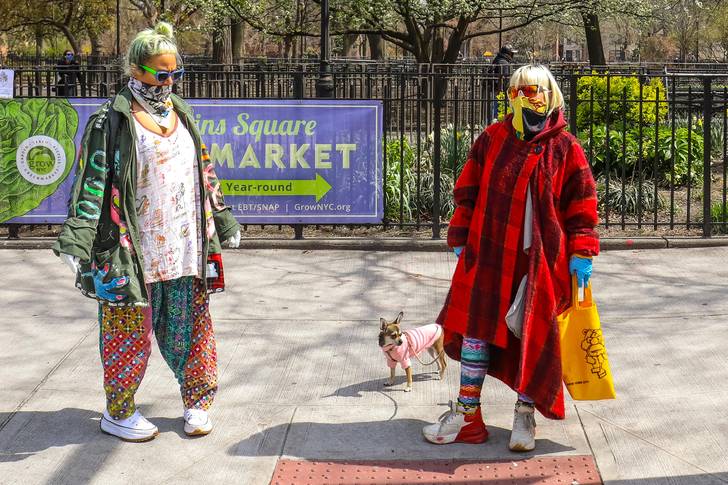 Two women in the East Village wearing colorful face coverings